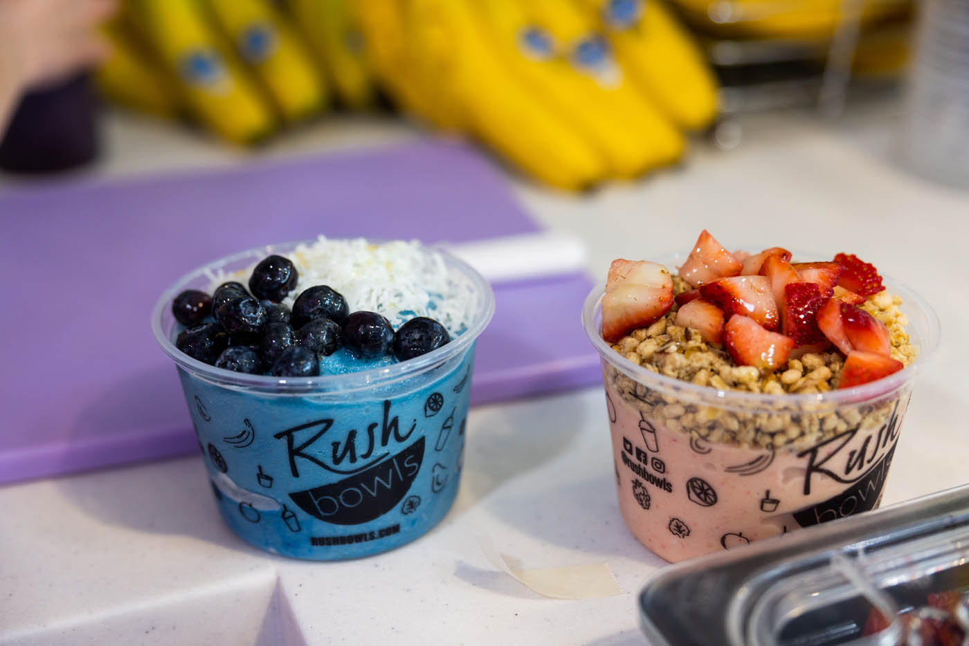 A picture of two acai smoothie bowls from Rush Bowls.